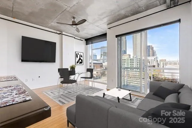 a view of a refrigerator in kitchen and wooden floor
