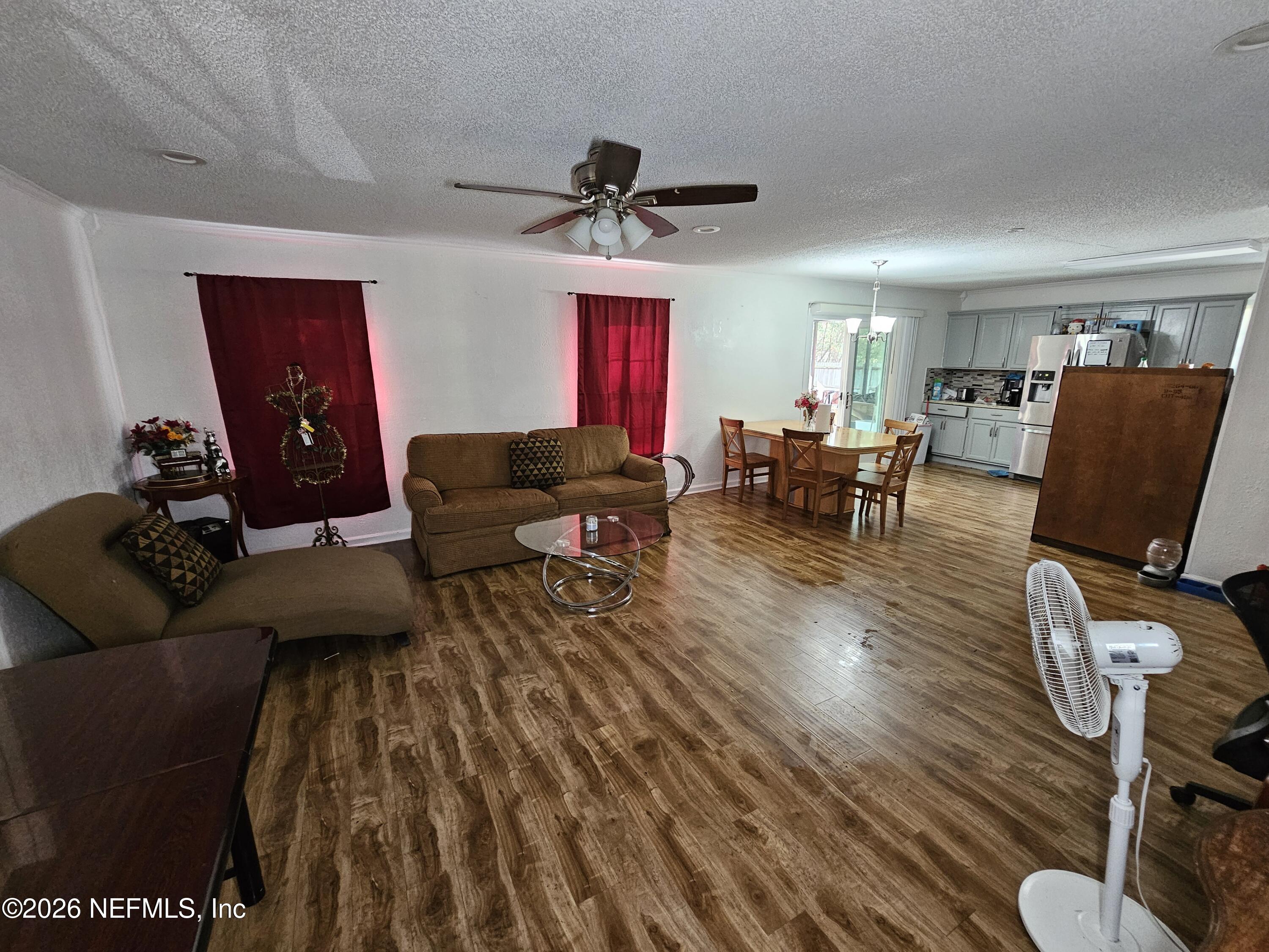 8450 Noroad Jacksonville, FL 32210 - Photo 2 of 14 a living room with furniture