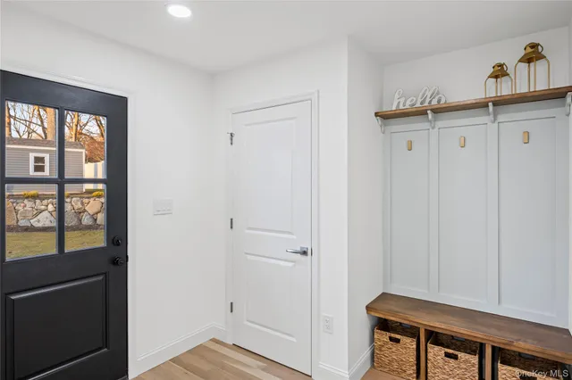 a view of closet area with empty racks