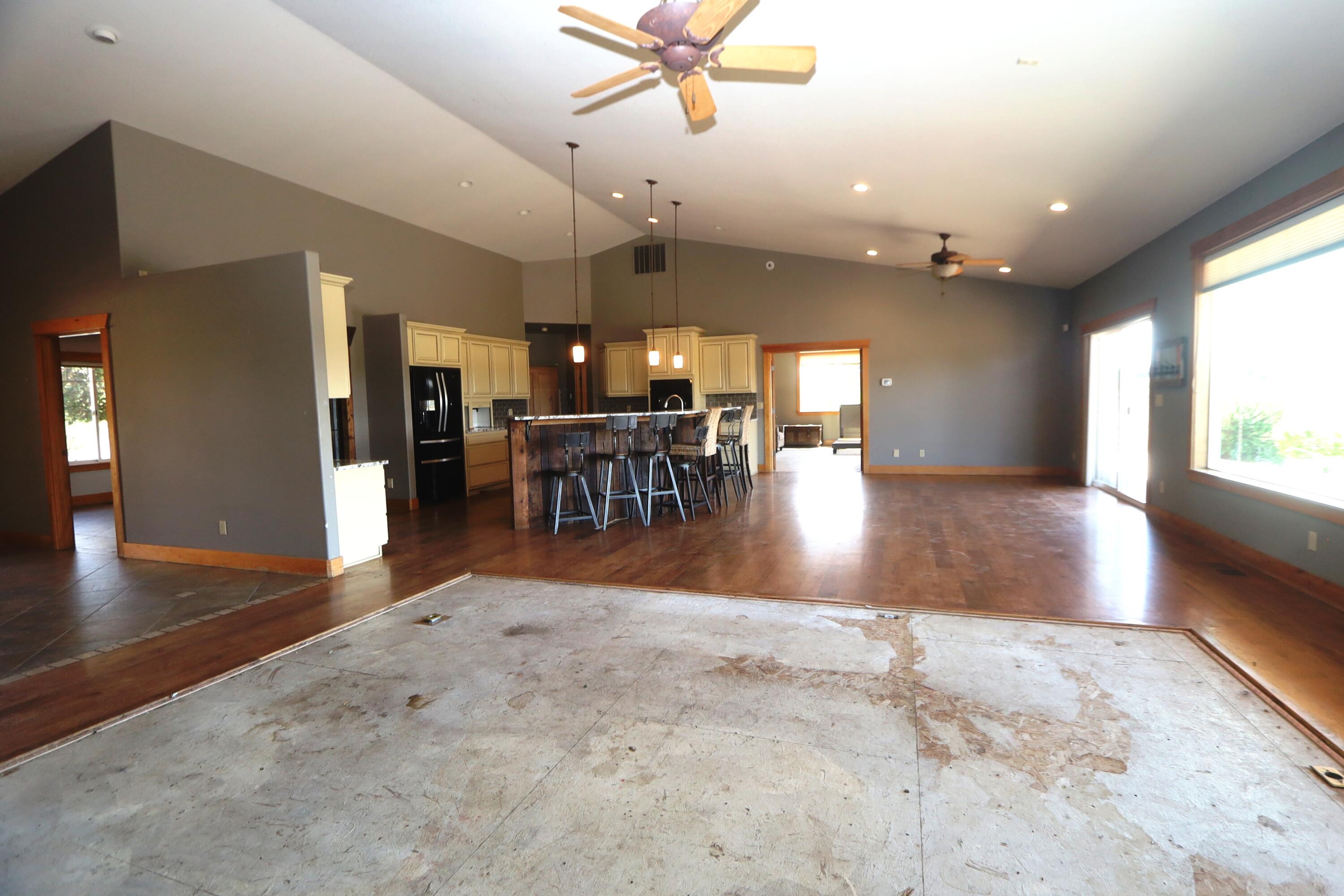 21491 Bear Creek Road Bend, OR 97701 - Photo 8 of 45 a view of a dining room with furniture