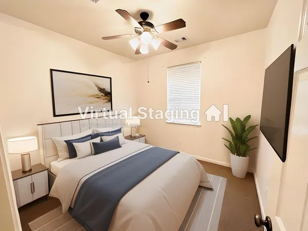 a view of a room with wooden floor and a bathroom