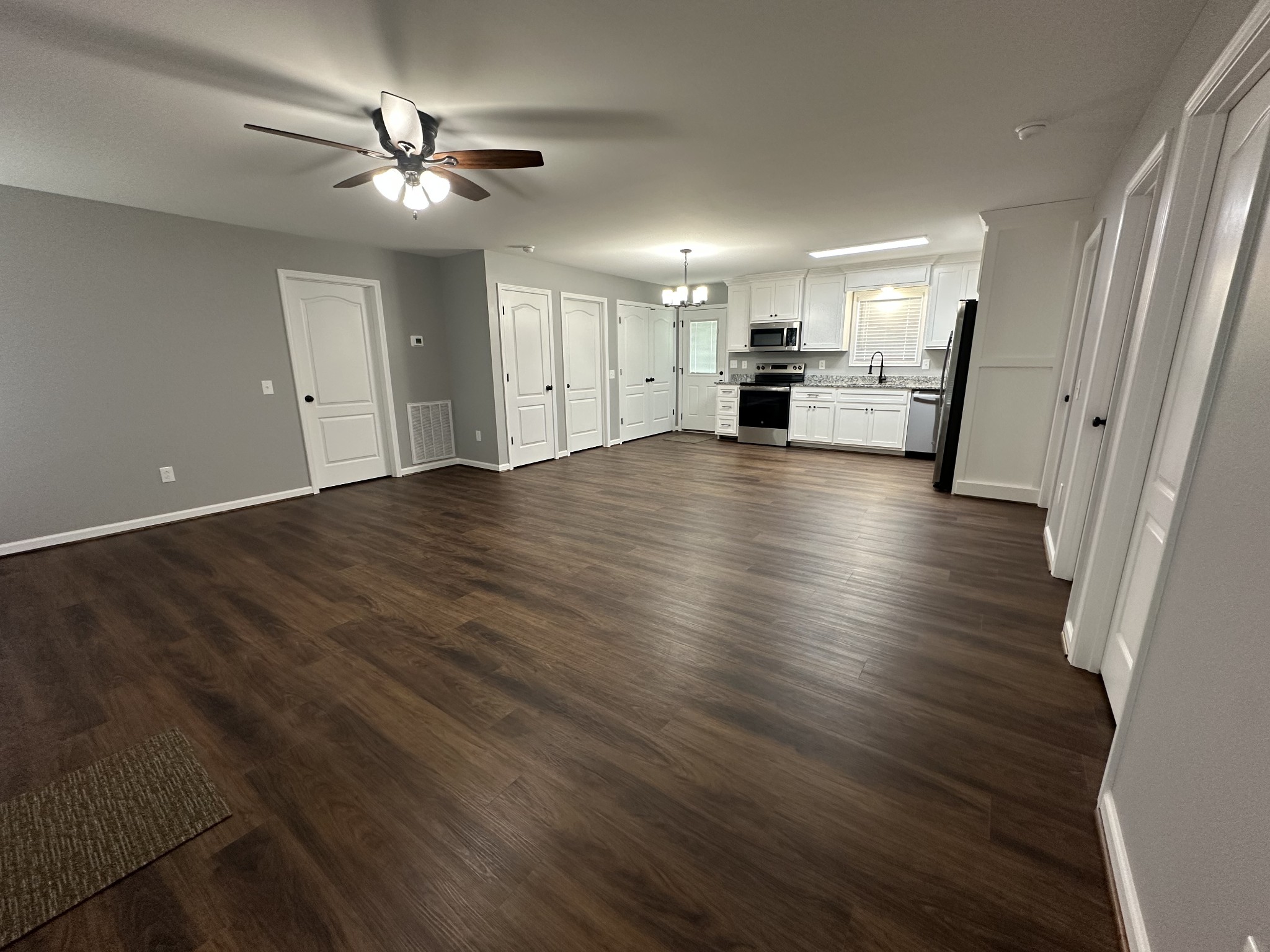 24 Henkle Lane Loretto, TN 38469 - Photo 12 of 21 a view of a kitchen with a sink and a stove top oven