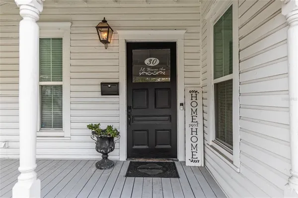 a view of a entryway door front of house