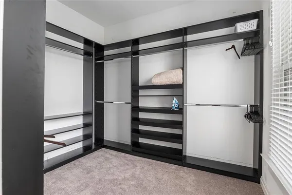 a bathroom with a bathtub and a sink