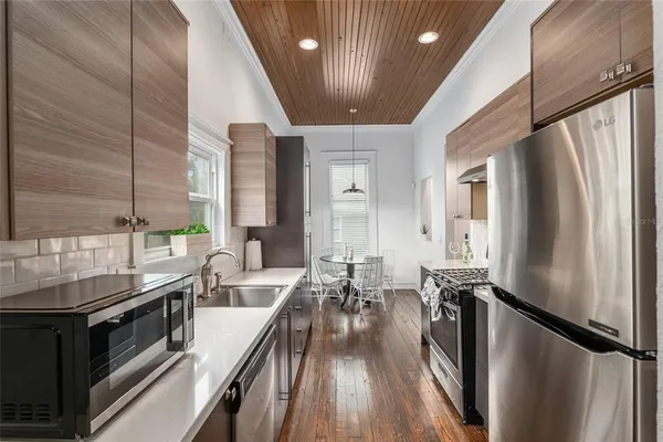 a kitchen with a sink and a window