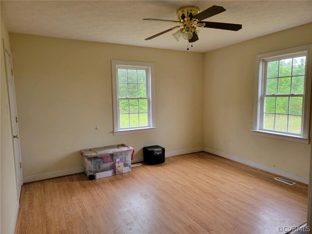 6851 Cox Road Wilsons, VA 23894 - Photo 39 of 50 a living room with furniture and a window