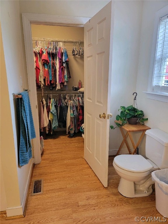 6851 Cox Road Wilsons, VA 23894 - Photo 43 of 50 a view of walk in closet with clothes and shoes