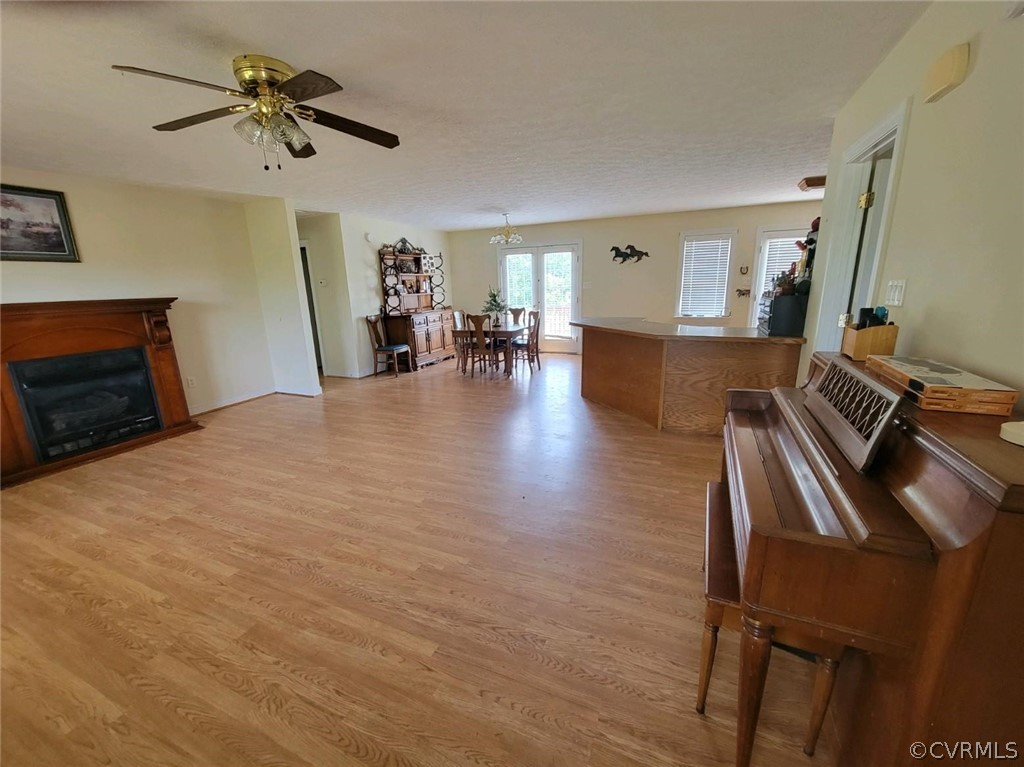 6851 Cox Road Wilsons, VA 23894 - Photo 47 of 50 a living room with furniture and a fireplace