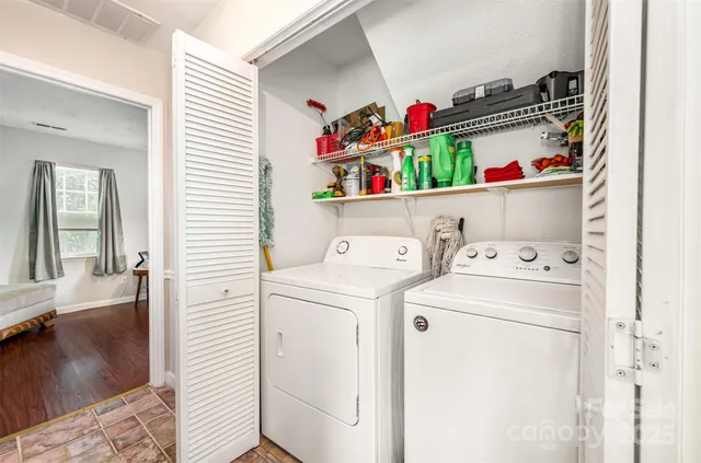 a utility room with dryer and washer