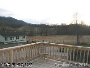 22 Tyler Street Clyde, NC 28721 - Photo 6 of 9 a view of balcony with a bench