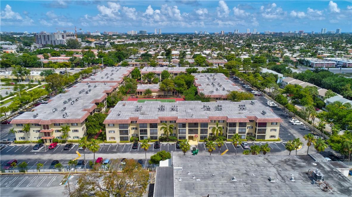 253 South Cypress Road, Unit 246 Pompano Beach, FL 33060 - Photo 1 of 33 an aerial view of multiple house