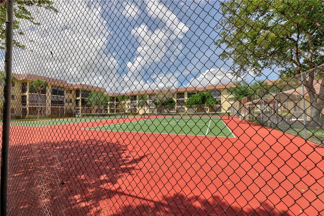253 South Cypress Road, Unit 246 Pompano Beach, FL 33060 - Photo 13 of 33 a view of a backyard