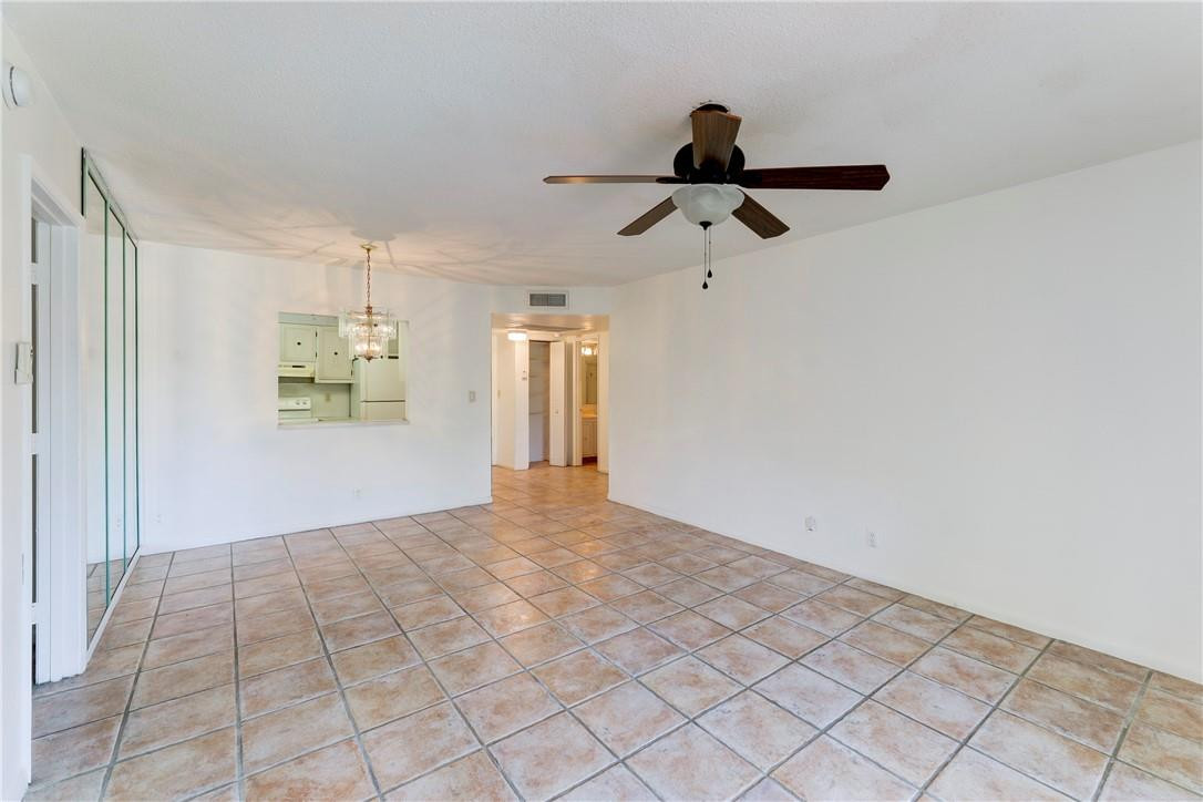 253 South Cypress Road, Unit 246 Pompano Beach, FL 33060 - Photo 19 of 33 a view of empty room with wooden floor