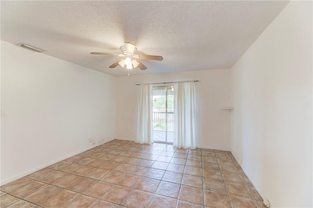 253 South Cypress Road, Unit 246 Pompano Beach, FL 33060 - Photo 23 of 33 a view of an empty room with a window