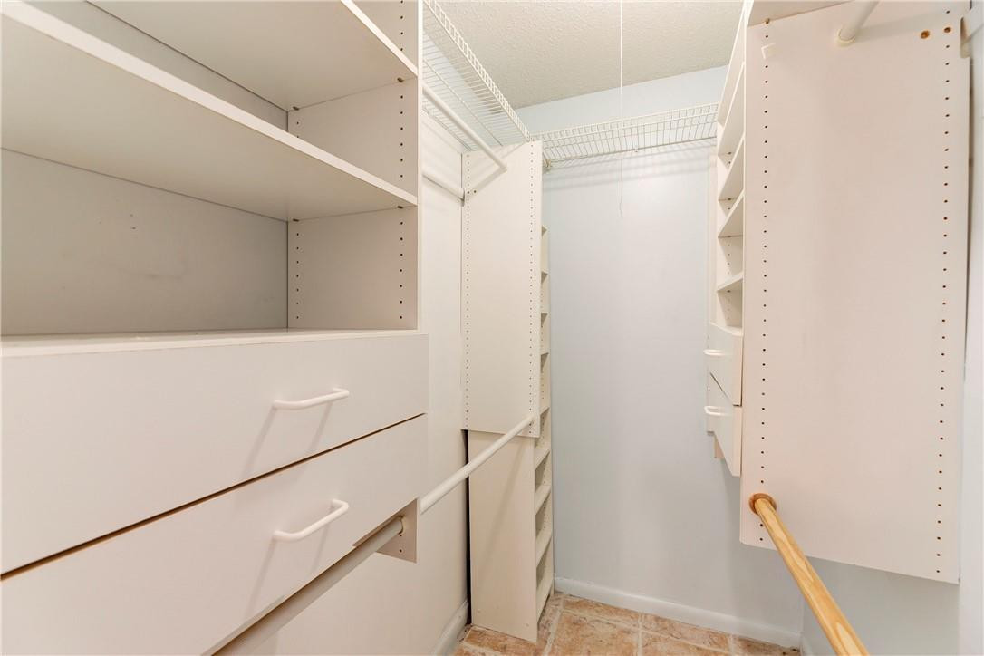 253 South Cypress Road, Unit 246 Pompano Beach, FL 33060 - Photo 26 of 33 a view of walk in closet
