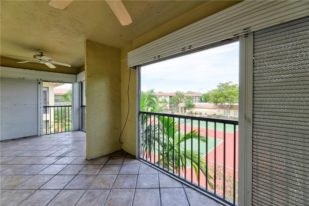 253 South Cypress Road, Unit 246 Pompano Beach, FL 33060 - Photo 32 of 33 a view of a room with windows