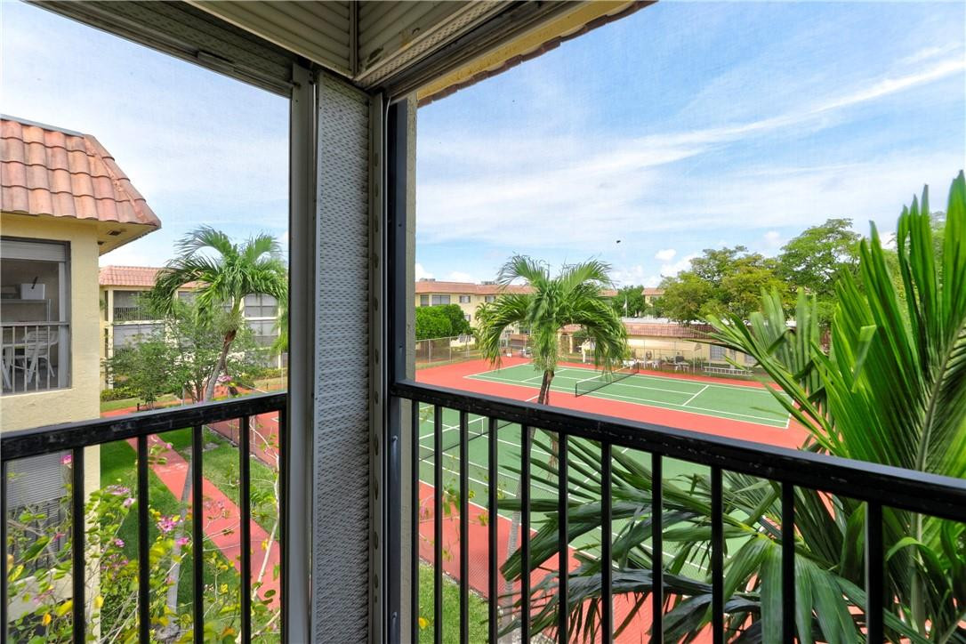 253 South Cypress Road, Unit 246 Pompano Beach, FL 33060 - Photo 33 of 33 a view of a balcony with plants