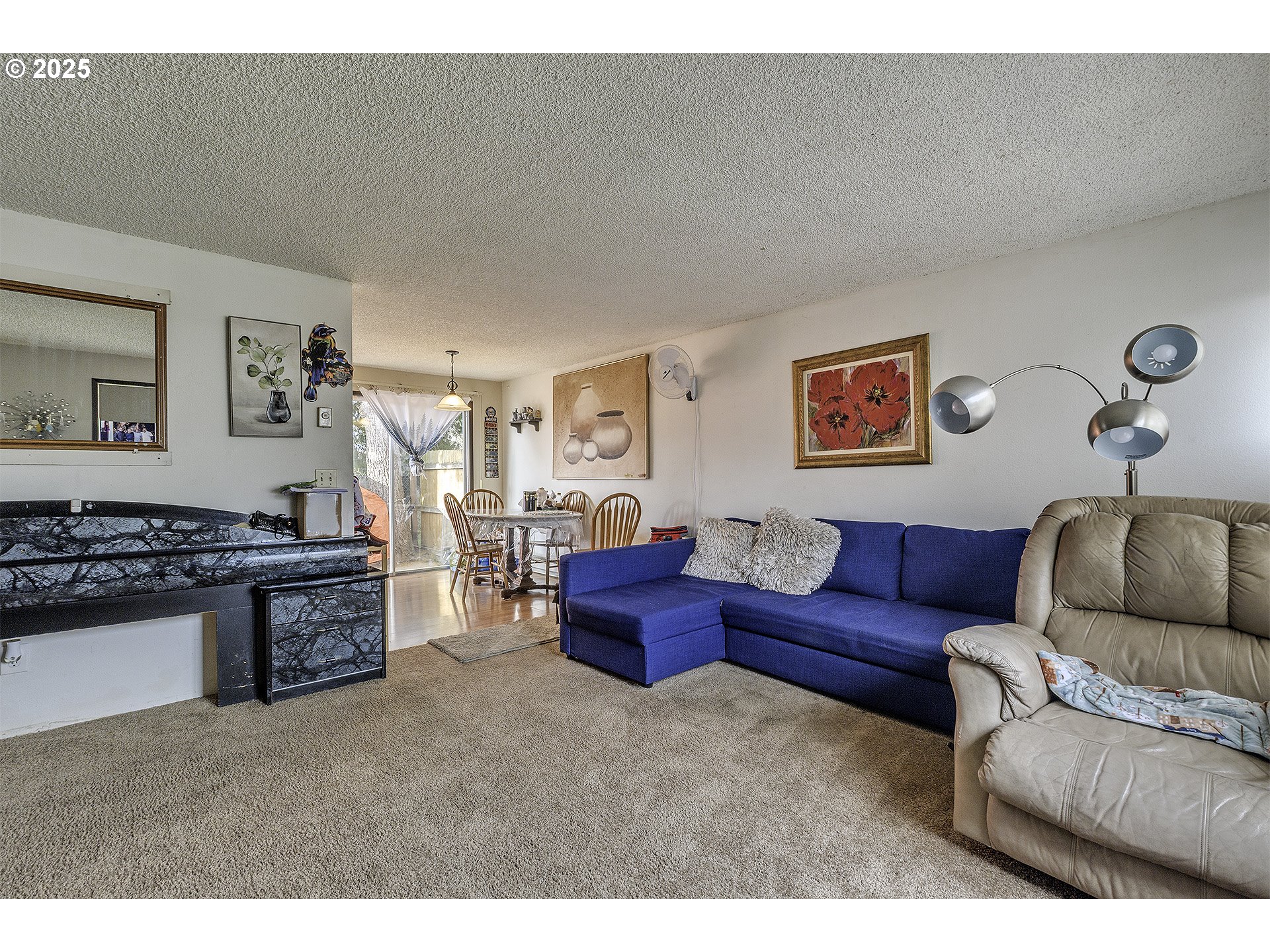 2724 North Davis Court Cornelius, OR 97113 - Photo 16 of 26 a living room with furniture and a kitchen counter top