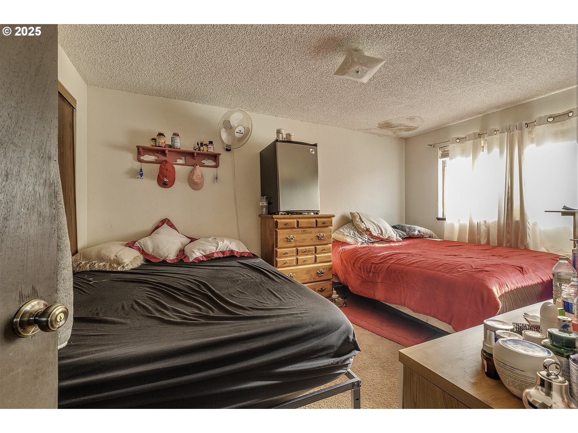 2724 North Davis Court Cornelius, OR 97113 - Photo 21 of 26 a bedroom with a bed and a dresser