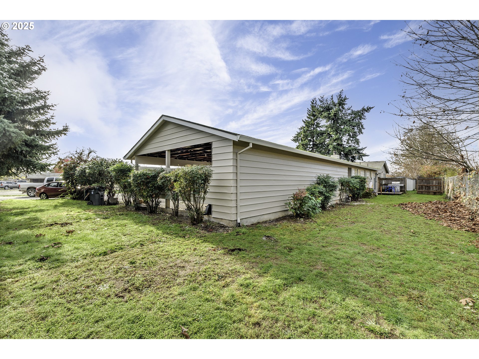 2724 North Davis Court Cornelius, OR 97113 - Photo 23 of 26 a backyard of a house with lots of green space