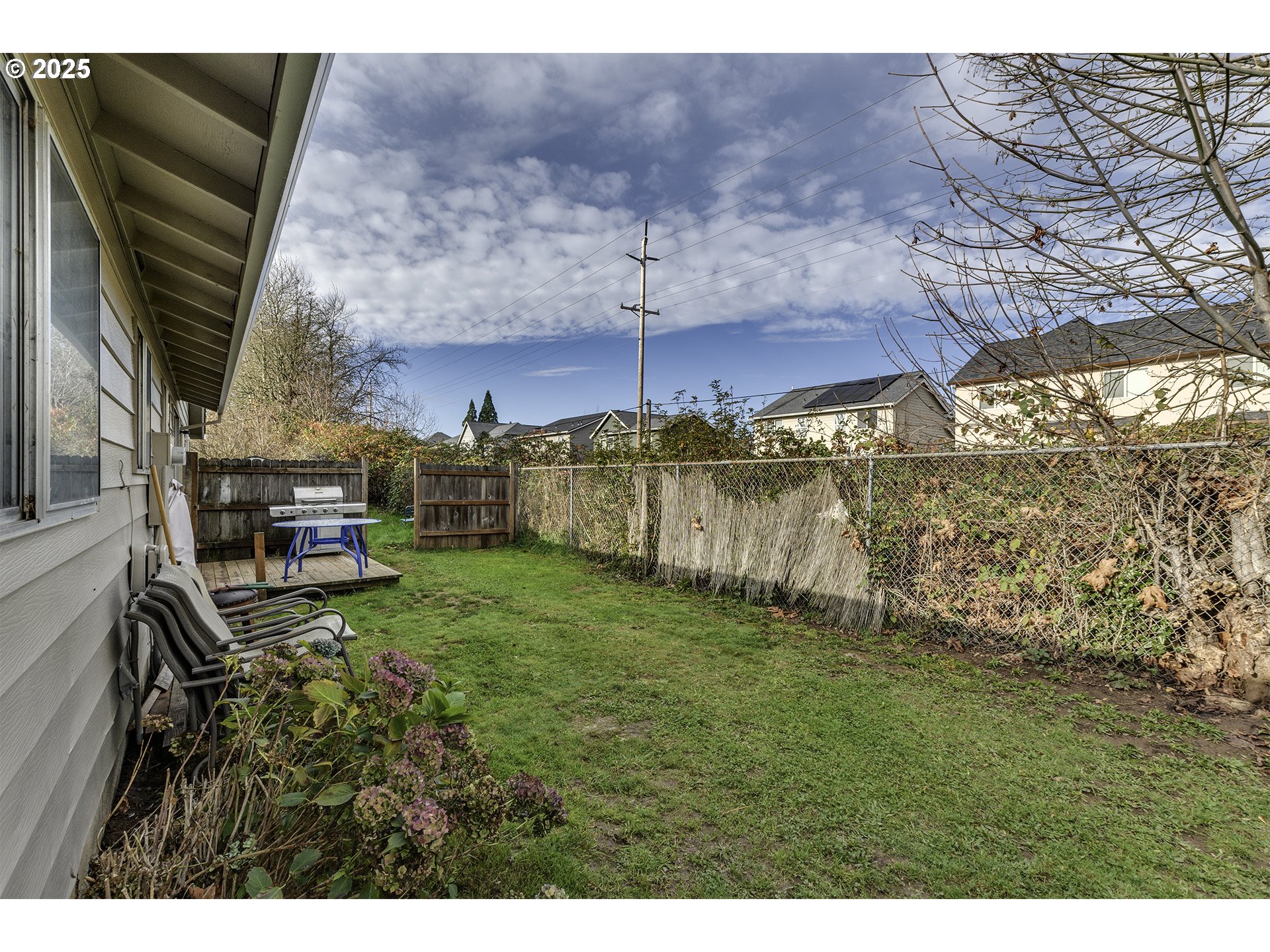 2724 North Davis Court Cornelius, OR 97113 - Photo 25 of 26 a backyard of a house with lots of green space