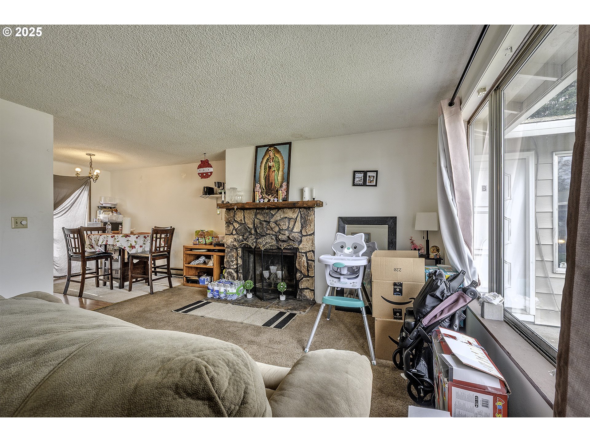 2724 North Davis Court Cornelius, OR 97113 - Photo 7 of 26 a living room with furniture and a fireplace