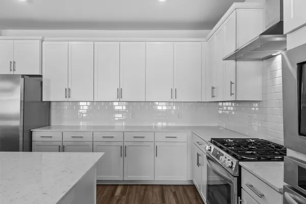 a view of kitchen with wooden floor