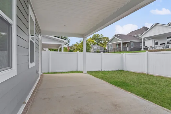 a view of backyard with green space