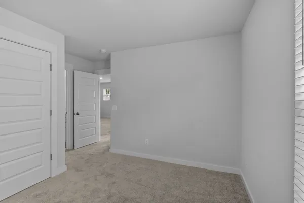wooden floor and cabinet in an empty room