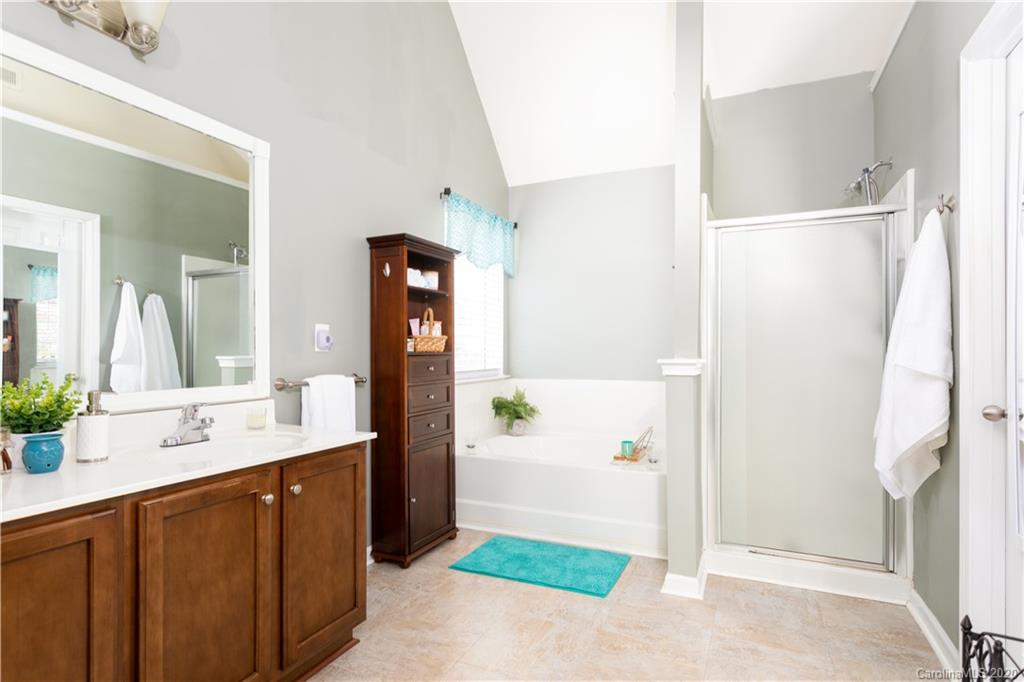 1703 Newland Road, Unit 124 Denver, NC 28037 - Photo 11 of 11 a bathroom with a double vanity sink and a mirror