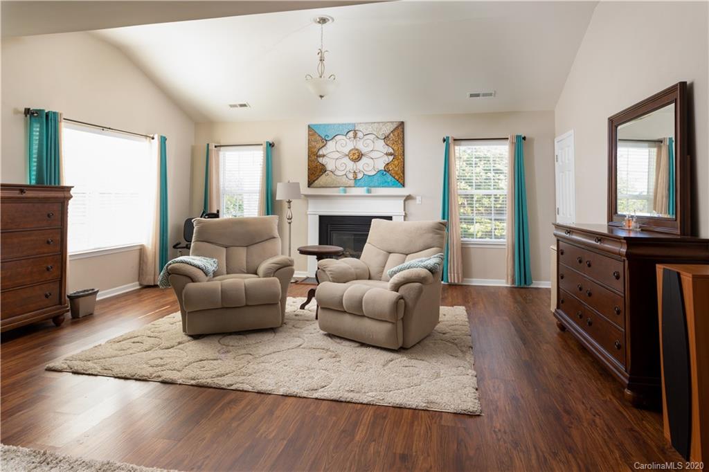 1703 Newland Road, Unit 124 Denver, NC 28037 - Photo 9 of 11 a living room with furniture fireplace and window