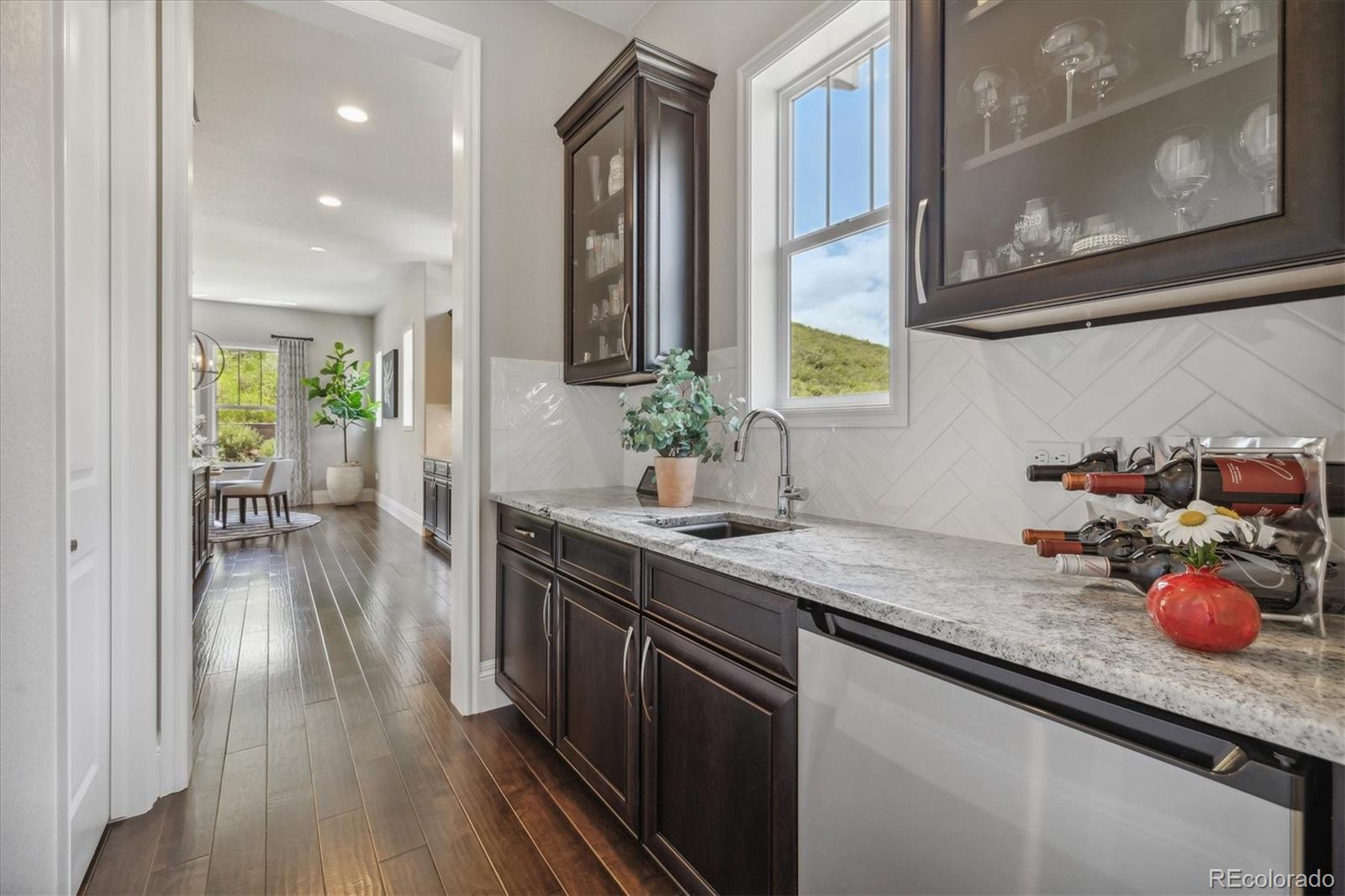 4837 Hogback Ridge Road Morrison, CO 80465 - Photo 11 of 40 a kitchen with sink and window