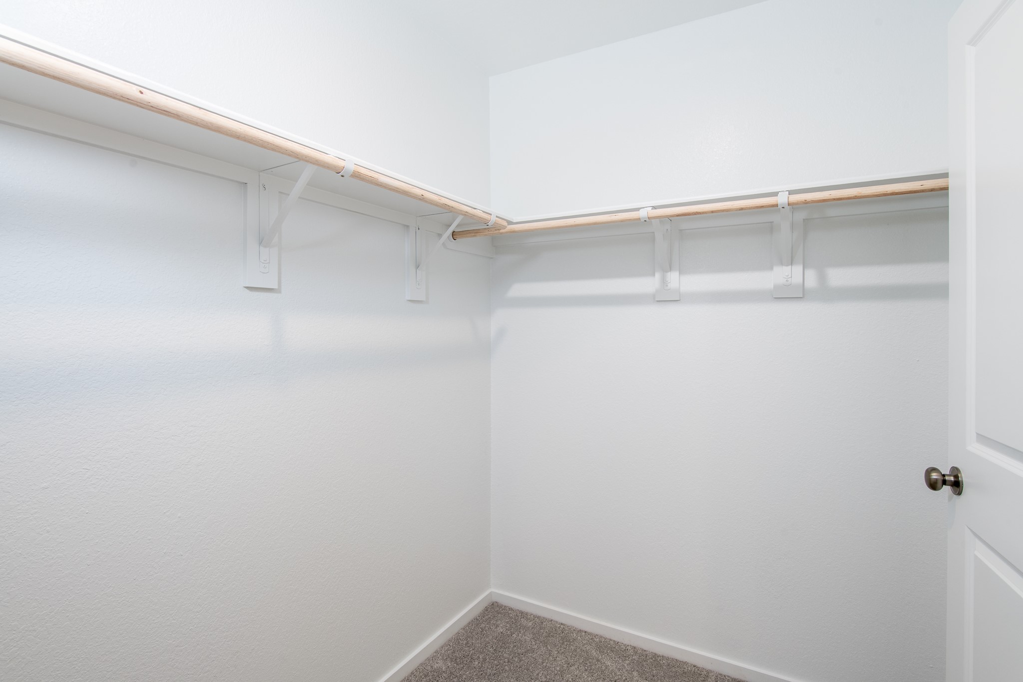 14852 North Ascot Bnd Circle Conroe, TX 77306 - Photo 14 of 21 a view of an empty walk in closet