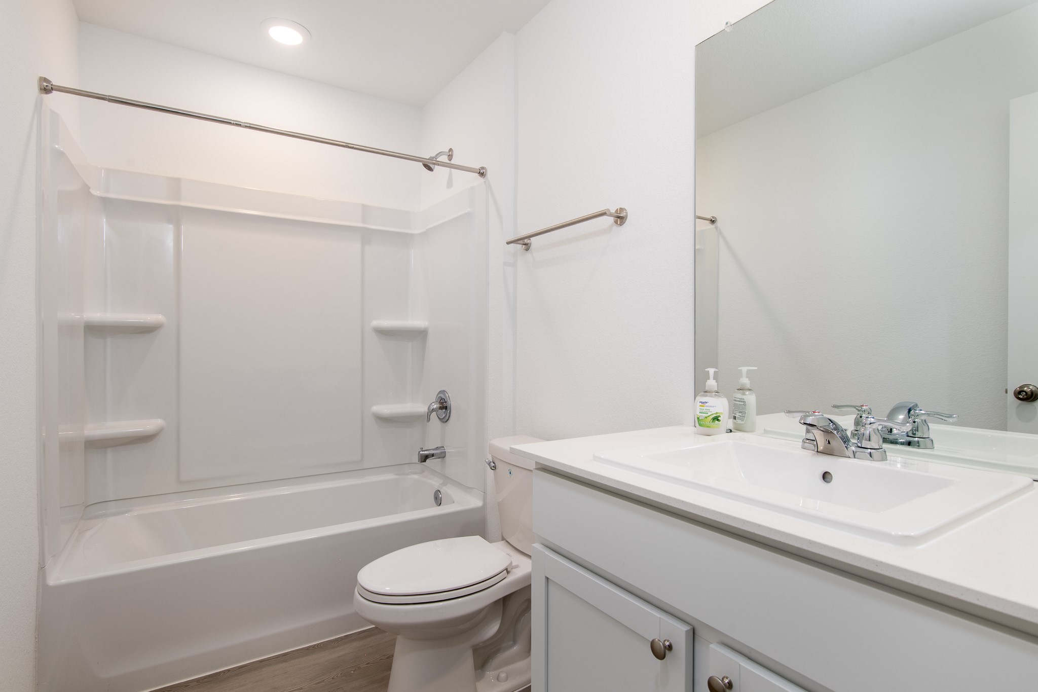 14852 North Ascot Bnd Circle Conroe, TX 77306 - Photo 17 of 21 a bathroom with a sink a toilet and a bathtub