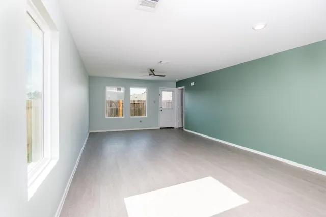 an empty room with windows