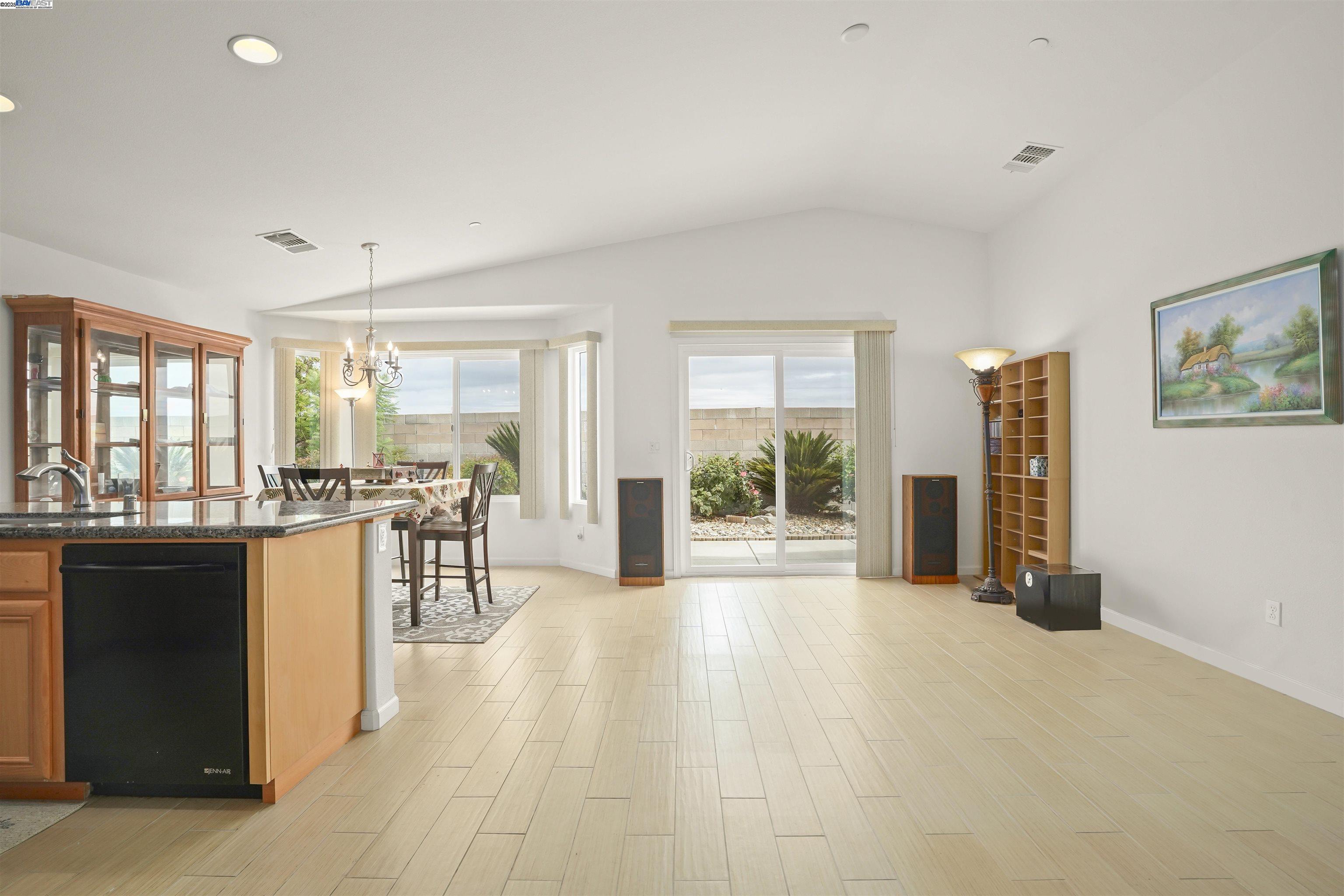 a view of a living room and dining room