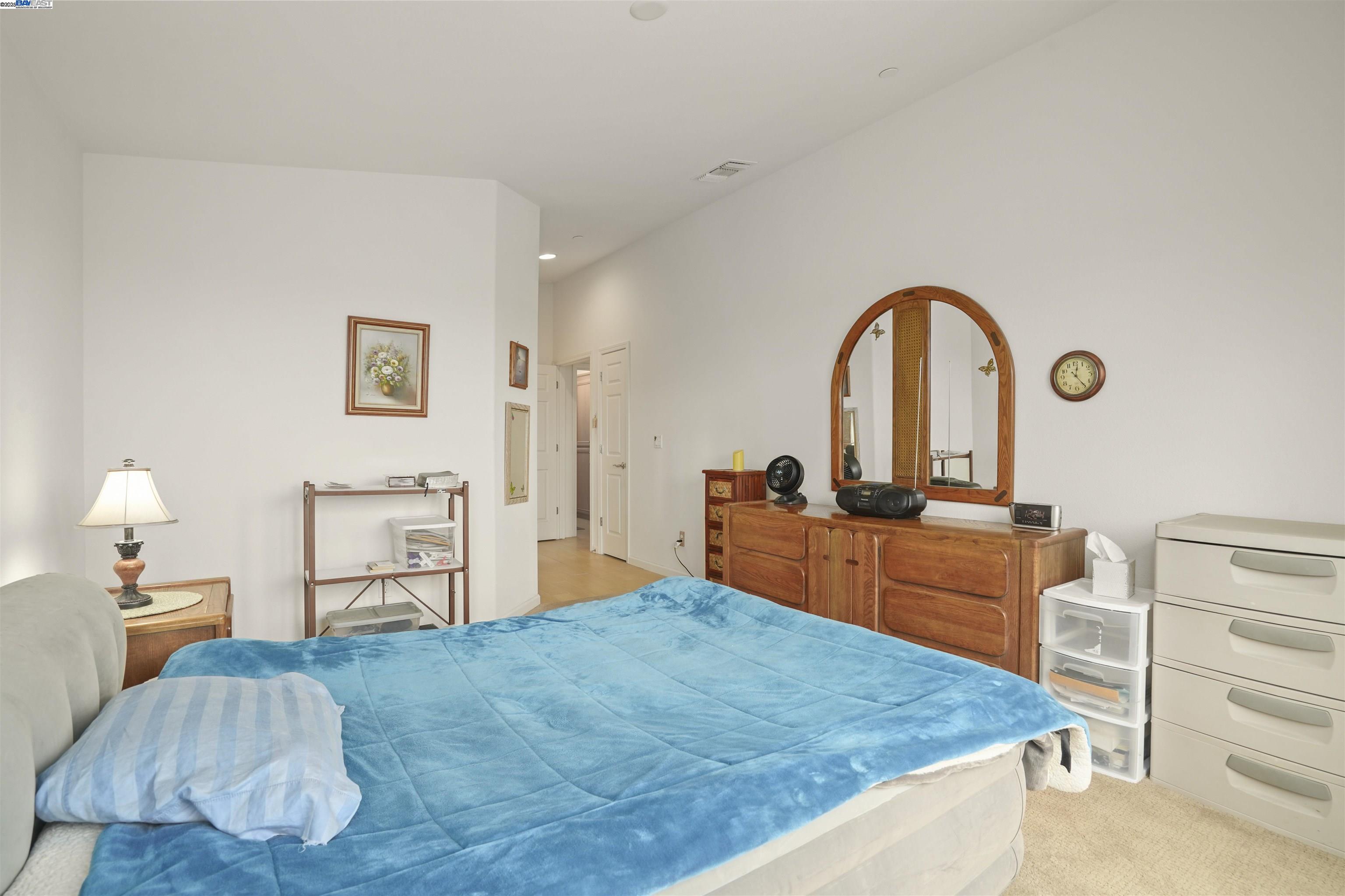 422 Saddle Rock Lane Rio Vista, CA 94571 - Photo 14 of 40 a bed room with a bed and a chair