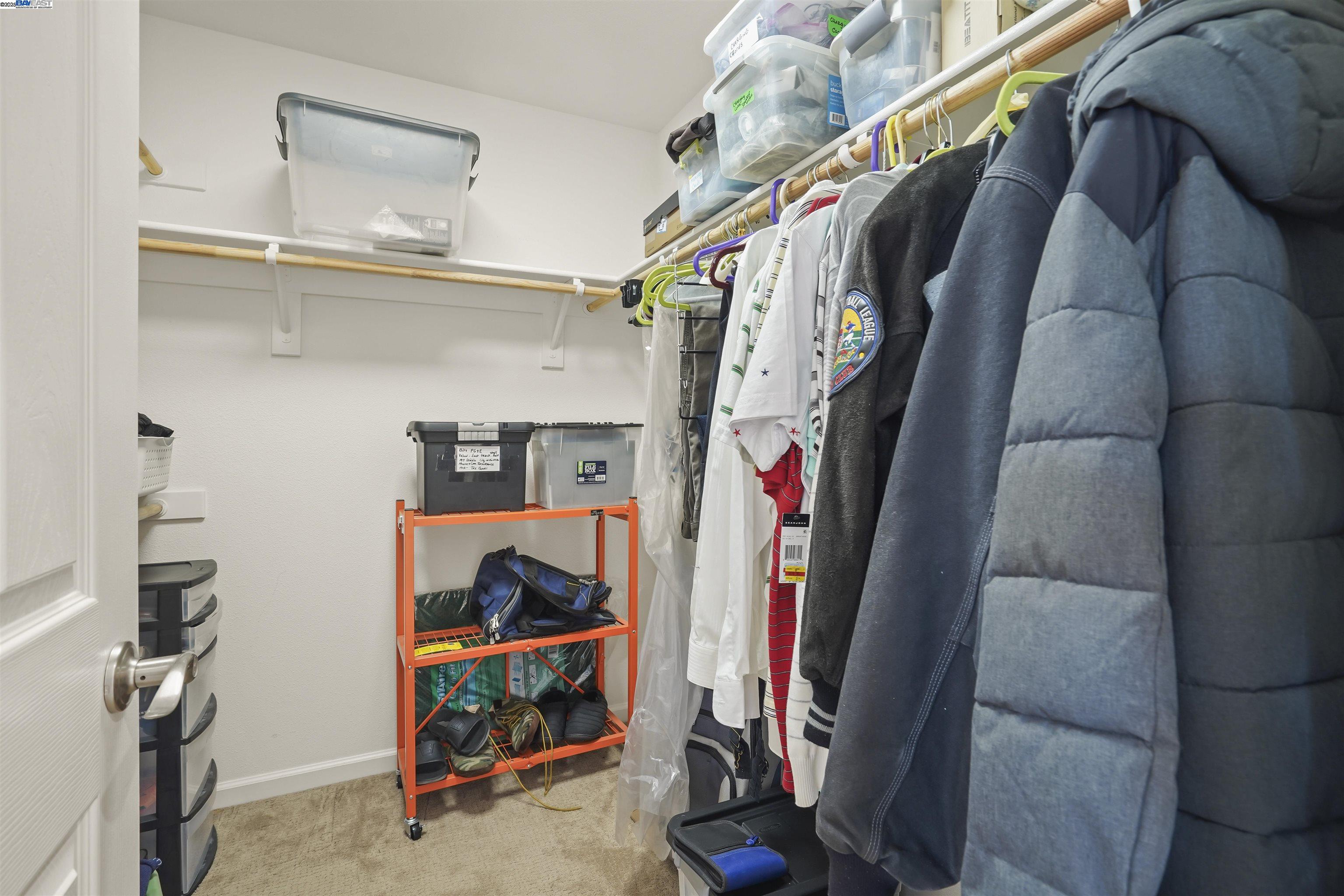 422 Saddle Rock Lane Rio Vista, CA 94571 - Photo 16 of 40 a view of walk in closet with clothes and shoes