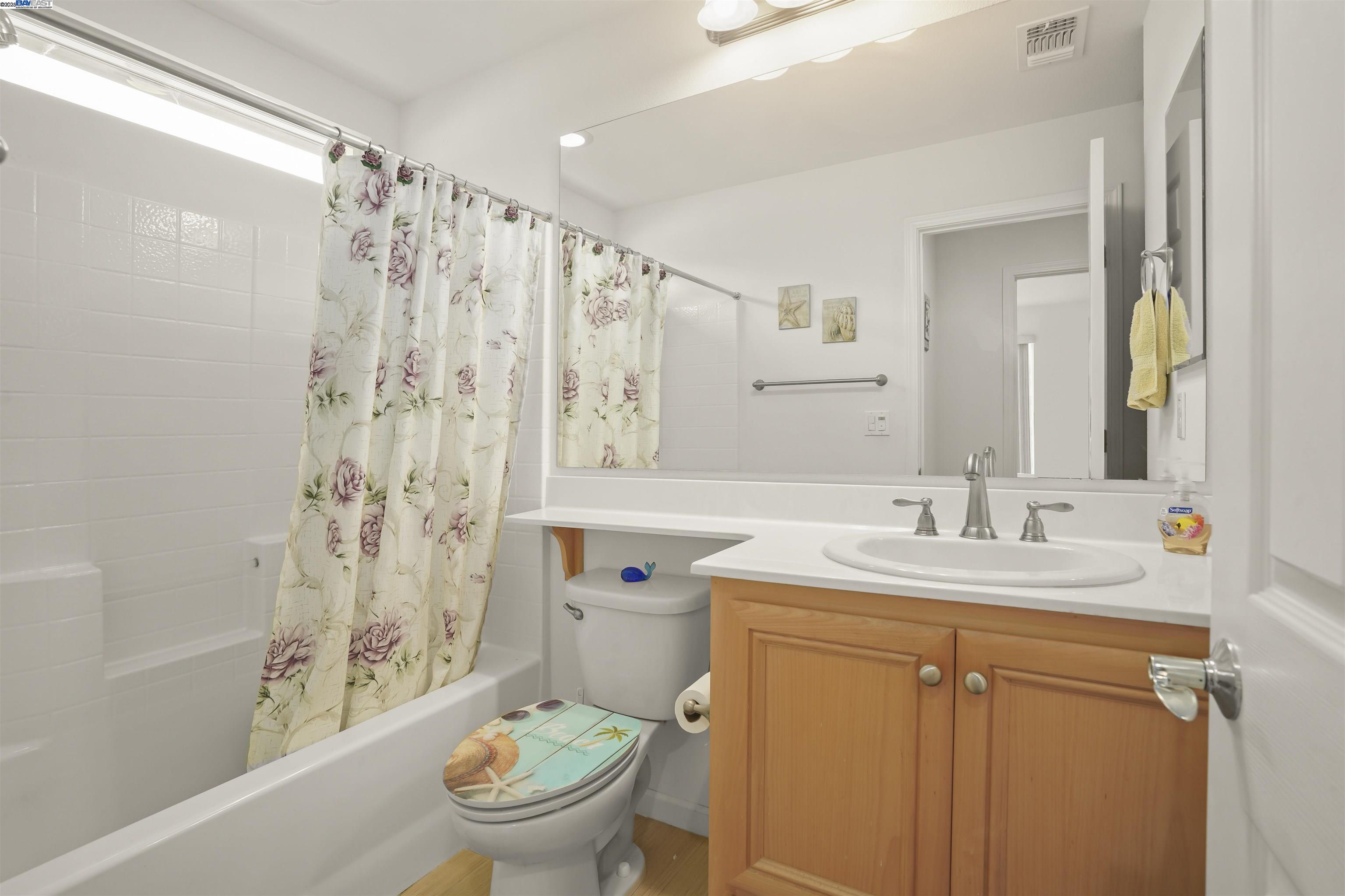 422 Saddle Rock Lane Rio Vista, CA 94571 - Photo 18 of 40 a bathroom with a sink toilet and shower