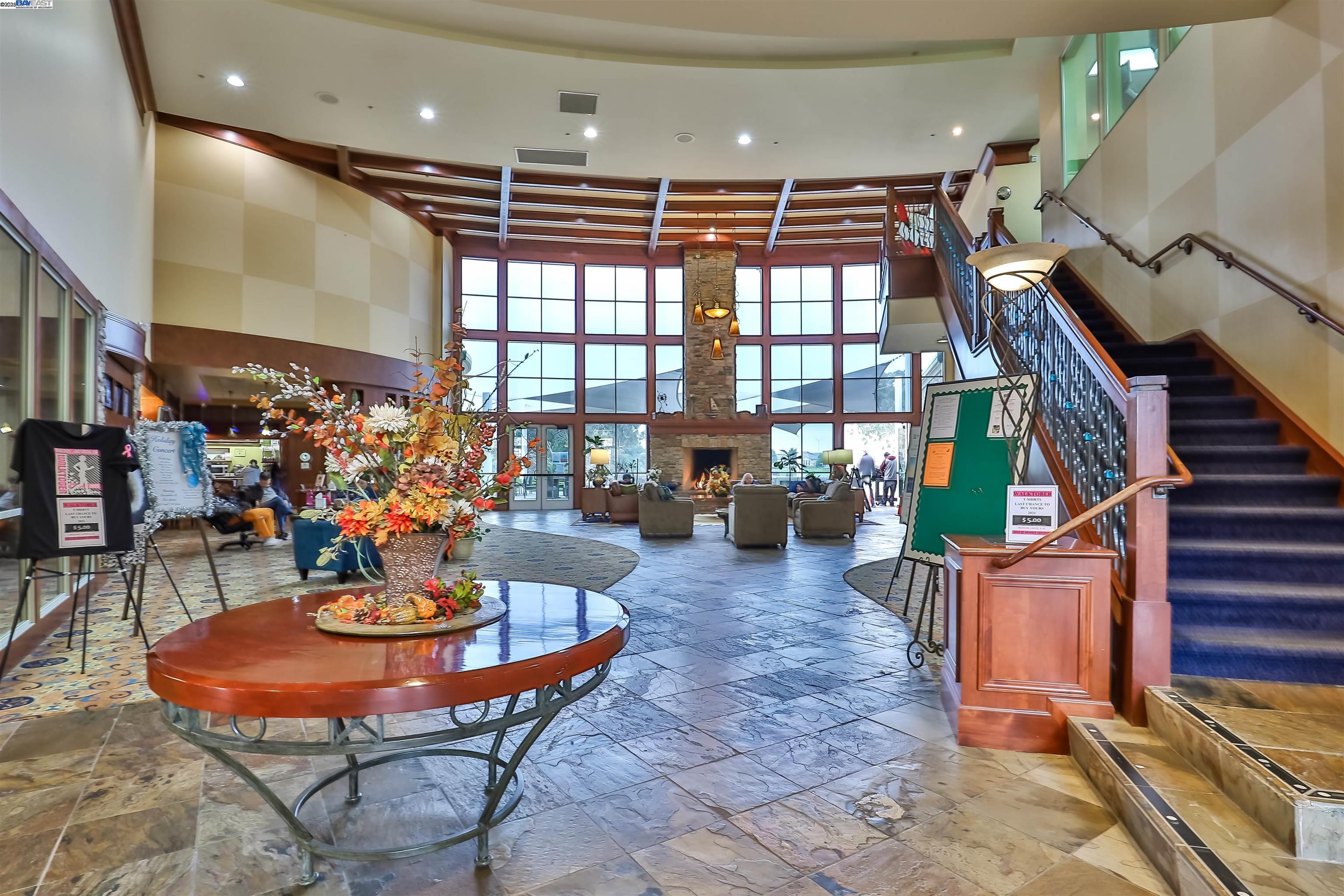 422 Saddle Rock Lane Rio Vista, CA 94571 - Photo 35 of 40 a living room with furniture a rug and a chandelier