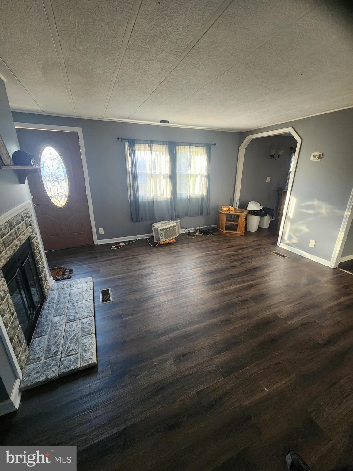 302 Arizona Avenue Williamstown, NJ 08094 - Photo 4 of 11 a living room with furniture and a fireplace