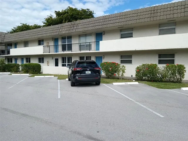 a car parked in front of a building