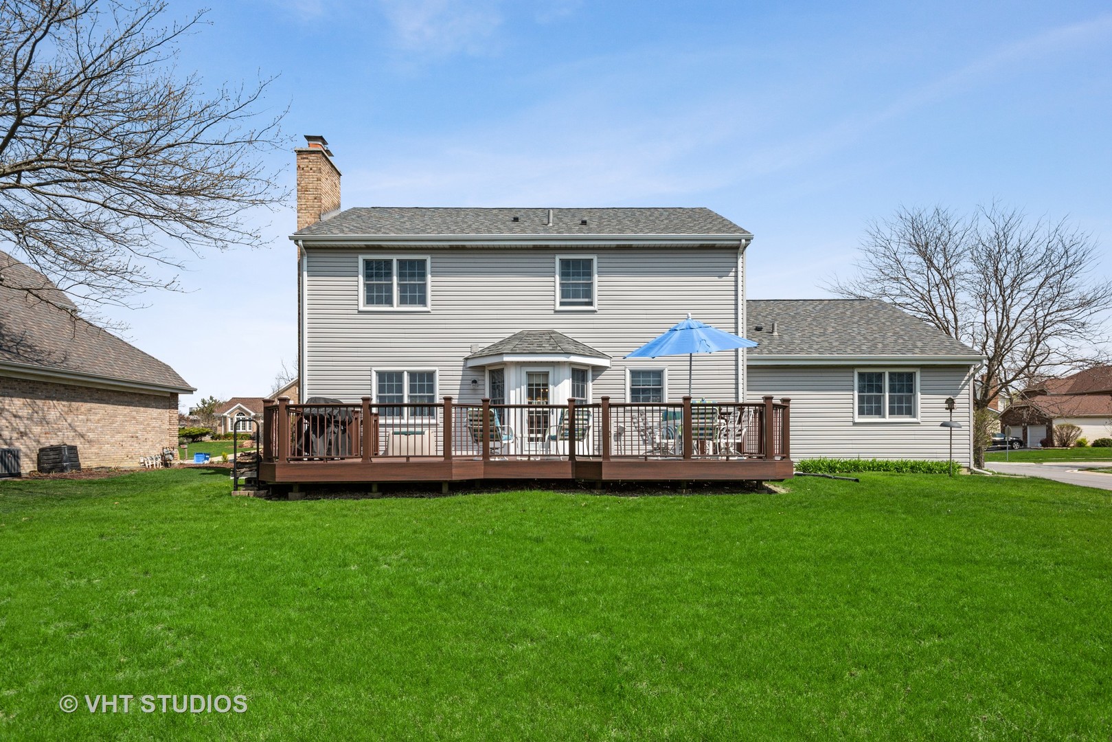 4338 Hatch Lane Lisle, IL 60532 - Photo 28 of 35 a view of a house with a big yard and large trees