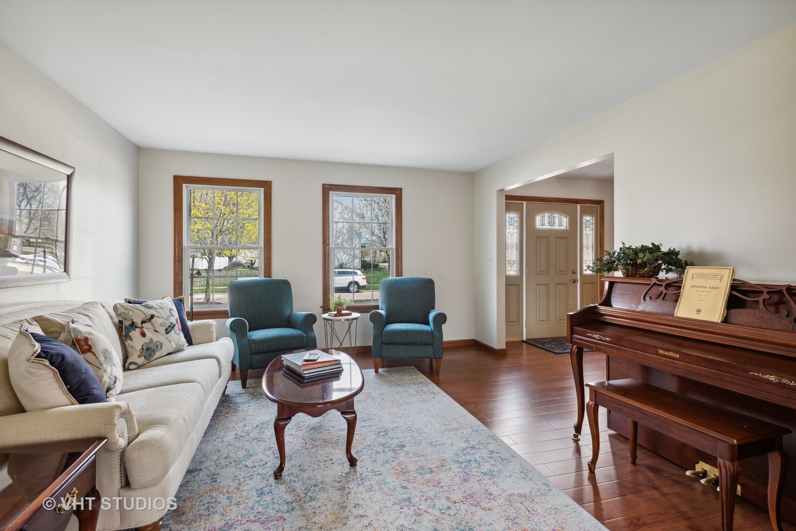 4338 Hatch Lane Lisle, IL 60532 - Photo 4 of 35 a living room with furniture a rug a lamp and a window