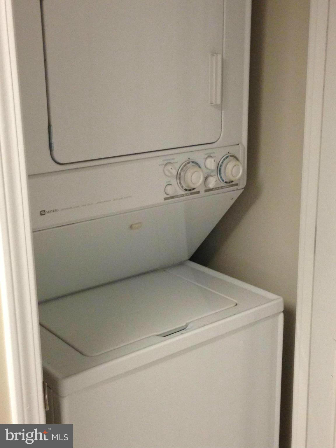 11710 Old Georgetown Road, Unit 1213 North Bethesda, MD 20852 - Photo 12 of 15 a close up view of washer and dryer