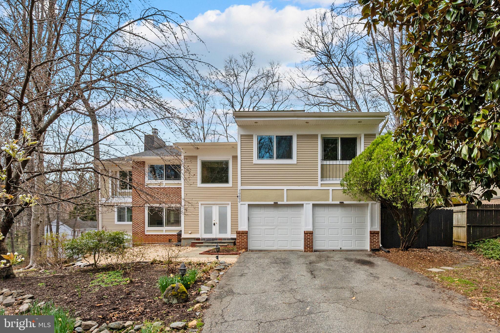 10600 Vantage Court Potomac, MD 20854 - Photo 2 of 91 a house that has a tree in front of the house