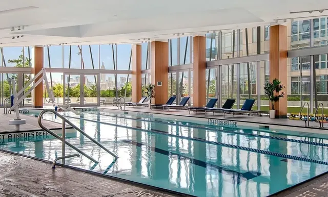 a bathroom with a sink and shower
