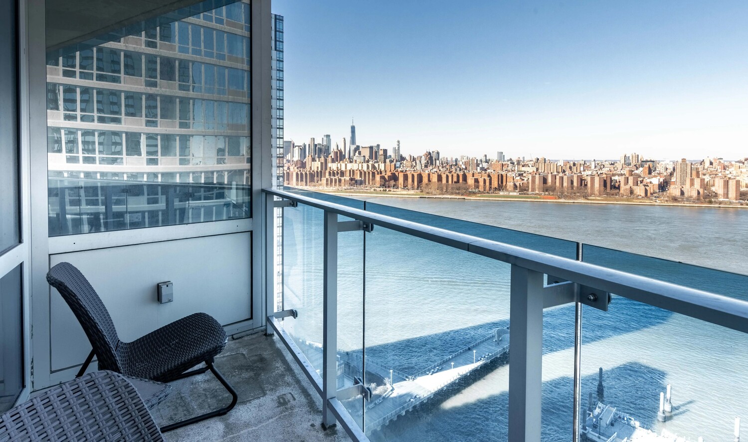22 North 6th Street, Unit 25D Brooklyn, NY 11249 - Photo 3 of 20 a balcony with table and chairs
