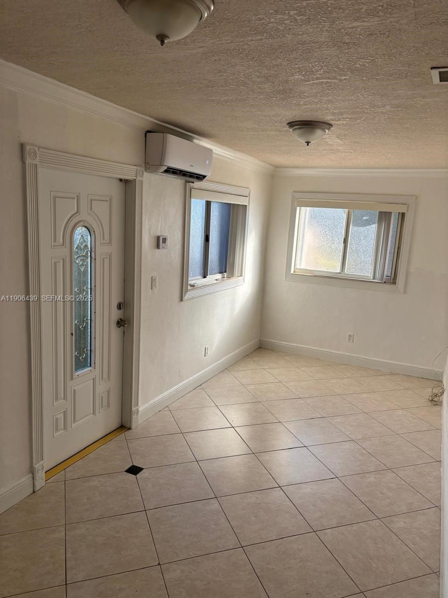 8635 Southwest 102nd Avenue Miami, FL 33173 - Photo 12 of 19 a view of an empty room with a window
