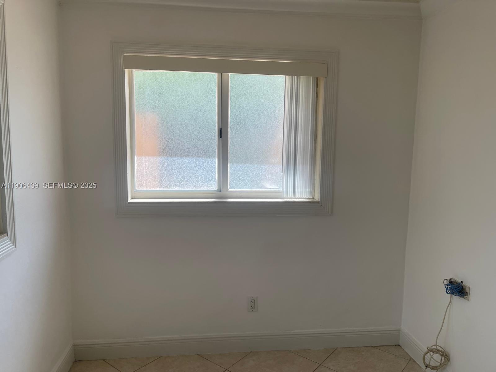 8635 Southwest 102nd Avenue Miami, FL 33173 - Photo 16 of 19 a view of a small space with a window